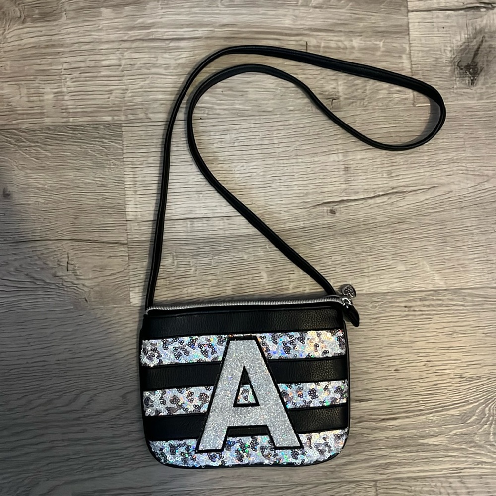Justice crossbody purse with letter “A”